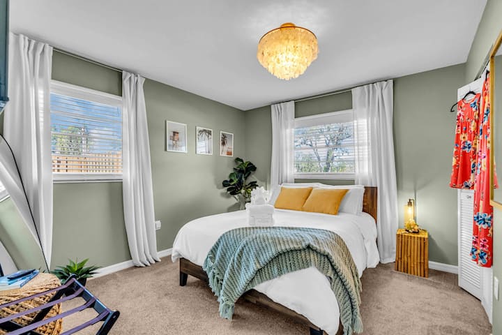 The third bedroom, a  queen guest room with a high-quality mattress, paired with luxurious linens.