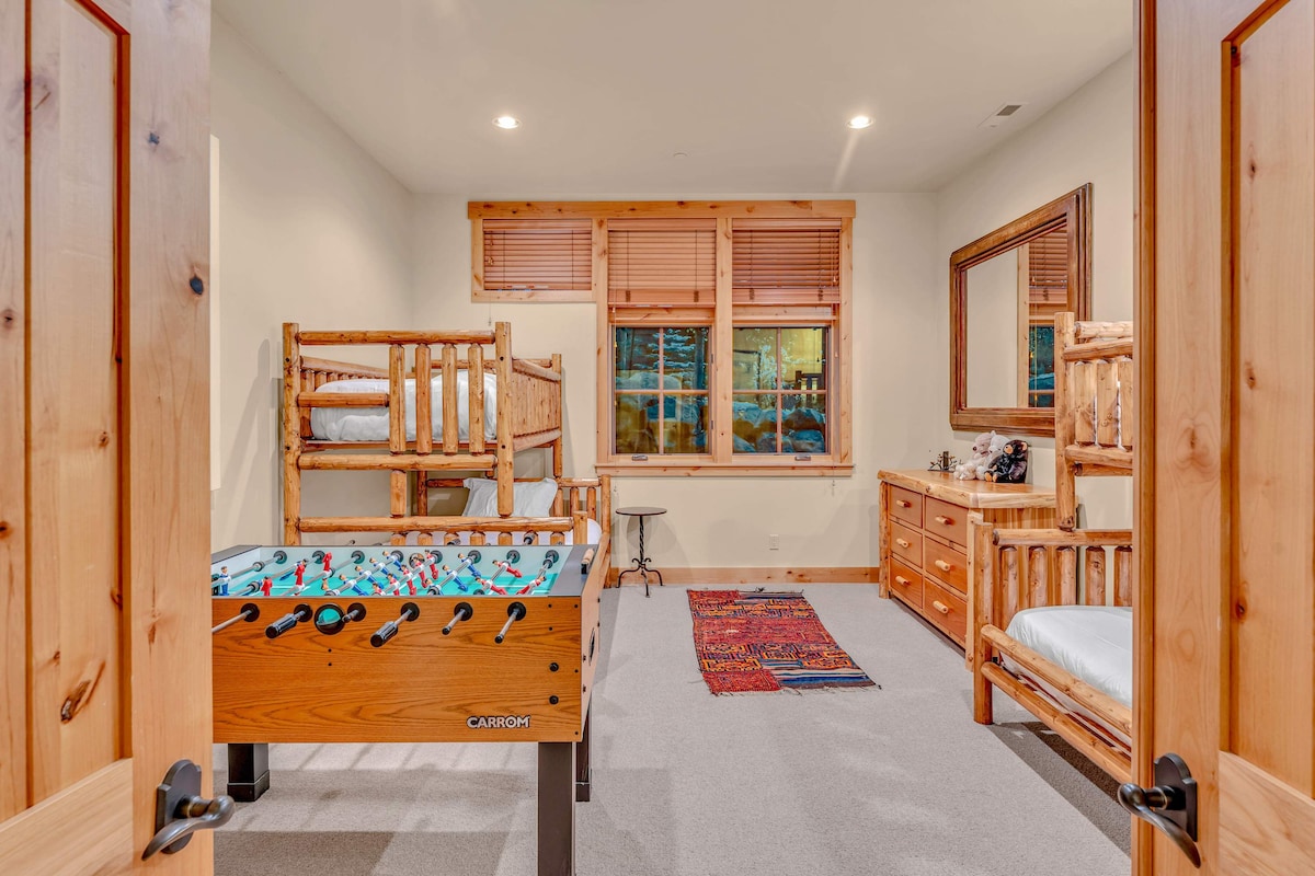 Bedroom 5: 2 twin-over-full bunk beds, closet, large dresser, foosball table, ground floor