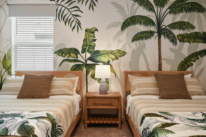 غرفة النوم 4 - الطابق الأرضي - سريران كاملان مع حمام خاص