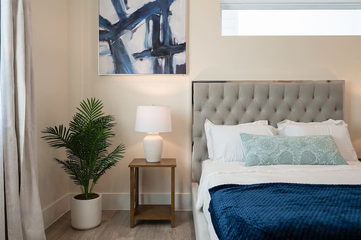 Wake up feeling refreshed in this bright and airy bedroom with a comfortable seating area.