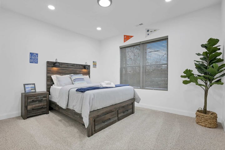 Bedroom 3 features a comfortable queen bed, a spacious closet, and shares a convenient bathroom with Bedroom 2.
