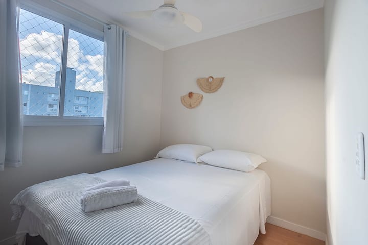 Air-conditioned bedroom with a double bed