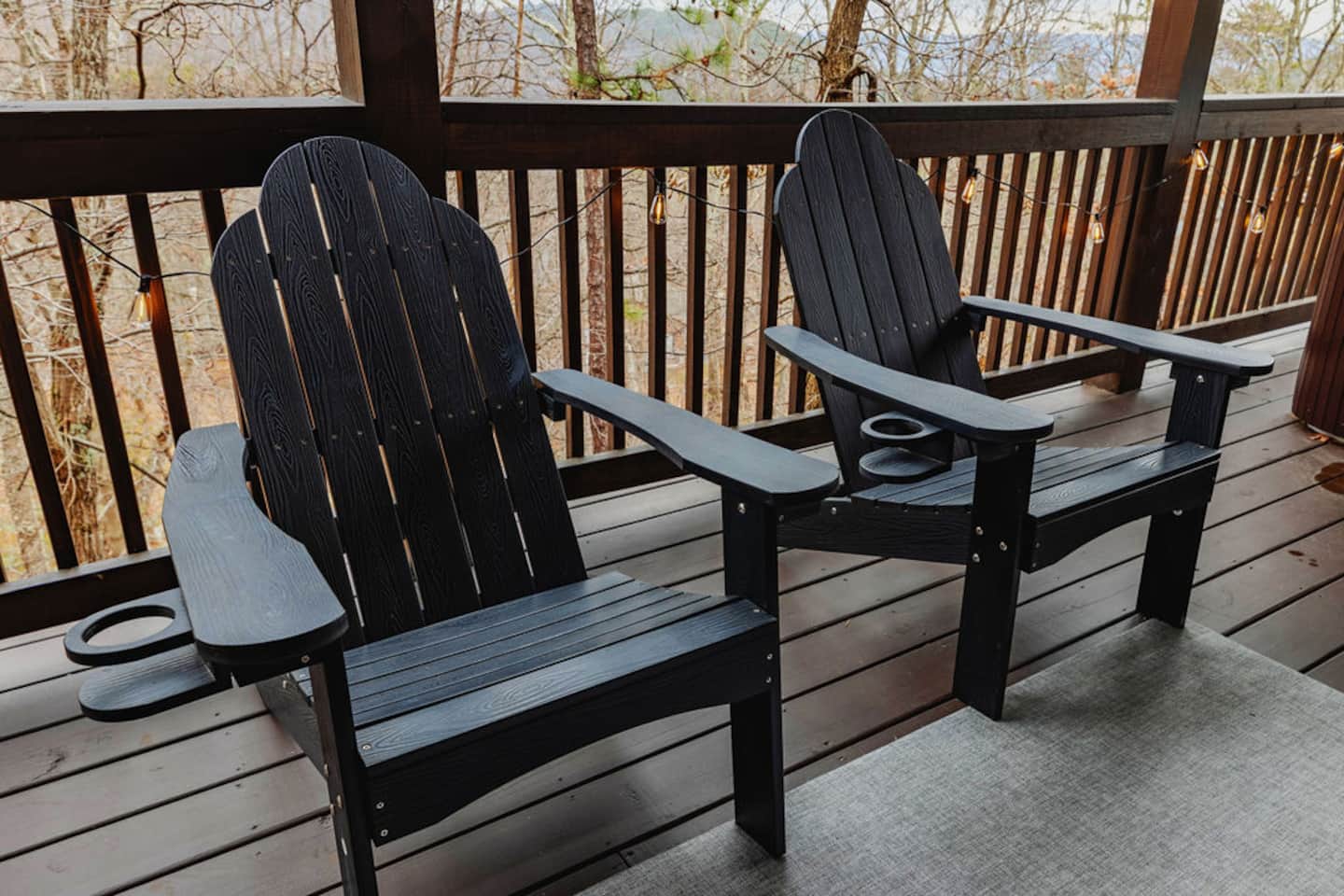 Find the two chairs at the end of the deck when you need five quiet minutes away from the group. String lights, a view, nothing else