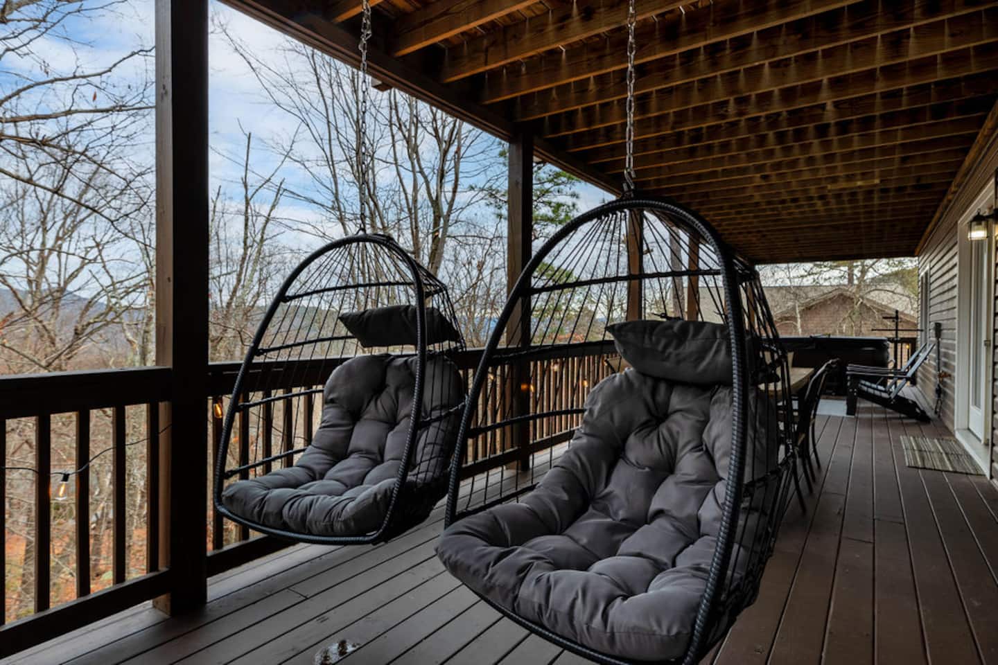Claim one of these swing chairs and don't feel bad about it. It's the best seat on the whole deck once the trees start swaying.