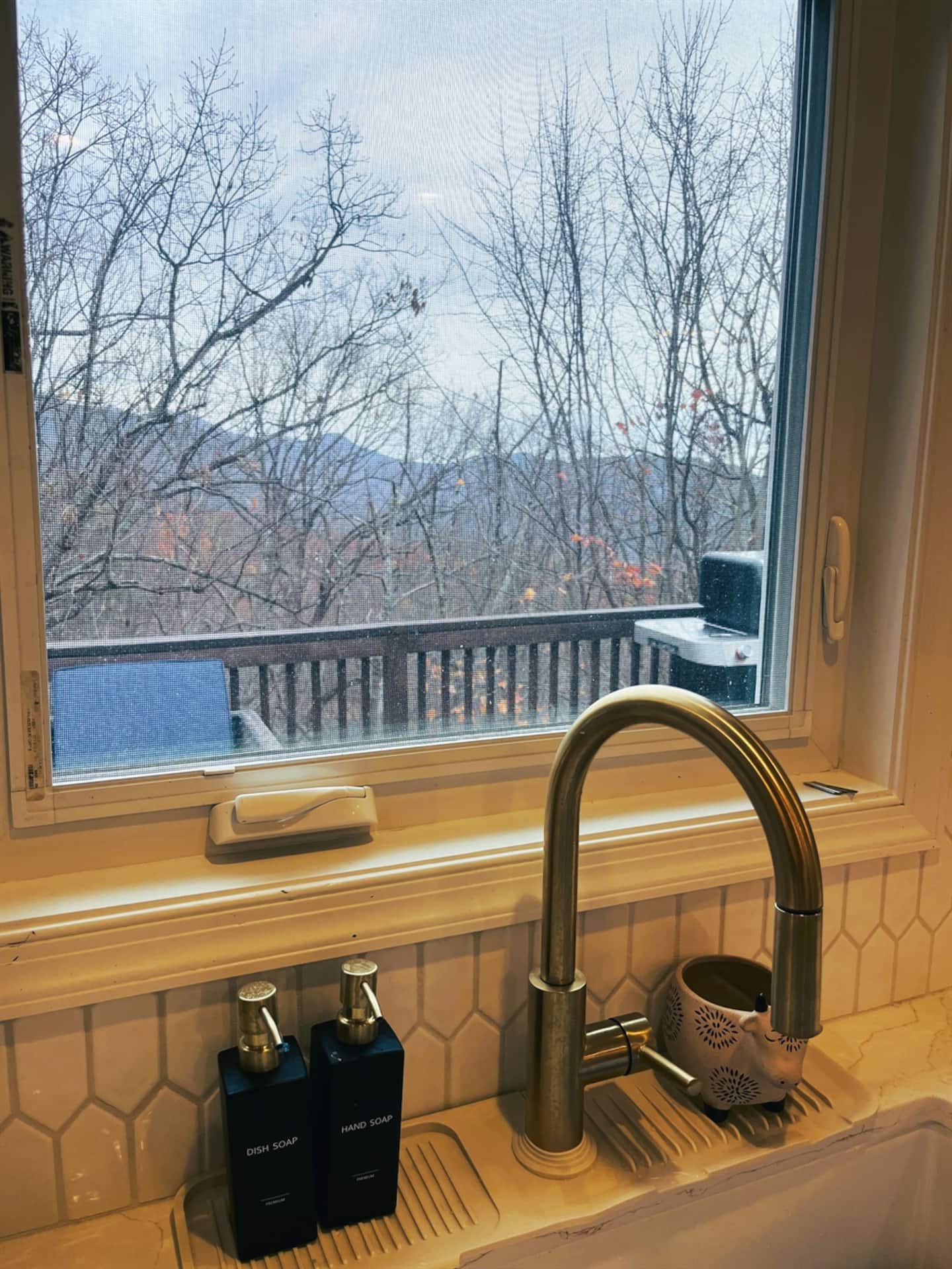 Watch the mountains out this window while you're stuck on dish duty, at least the view makes up for it. Soap and towels are already there,
