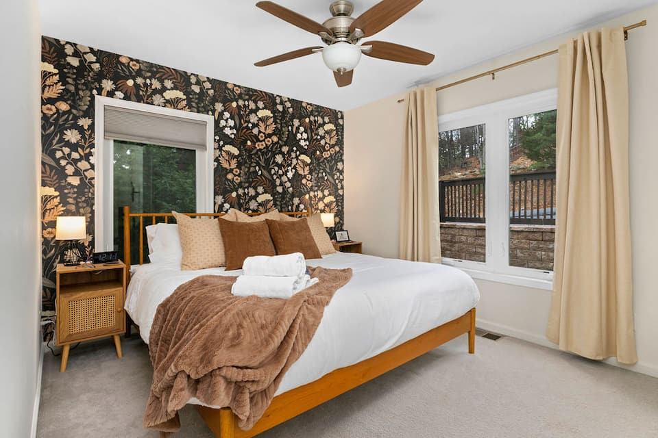 Autumn Floral King bedroom with slider door to the deck