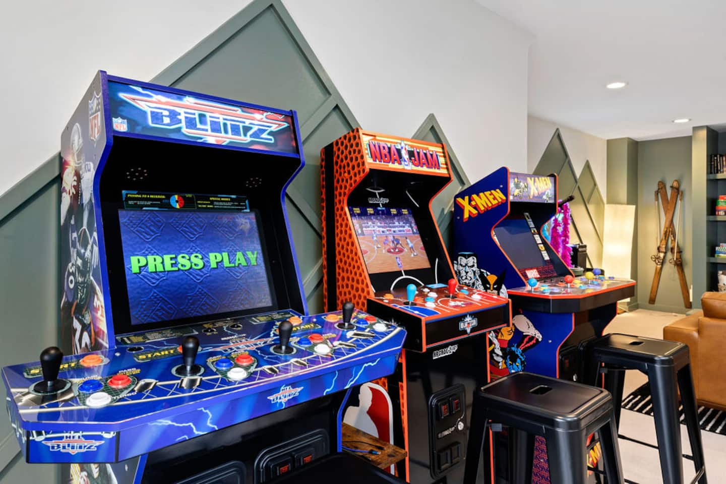 Pick a cabinet, any cabinet: NFL Blitz, NBA Jam, or X-Men. Pull up a bar stool while you wait your turn.