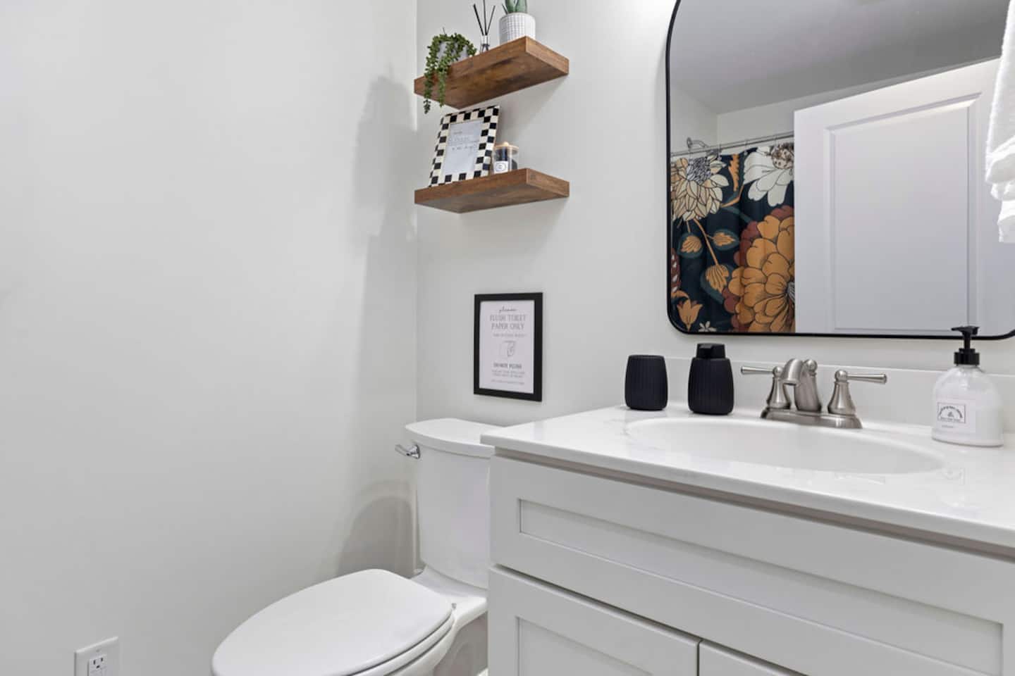 Claim the lower master and its own private bathroom, same setup, same privacy as the one upstairs. Nobody's sharing this suite with anybody.