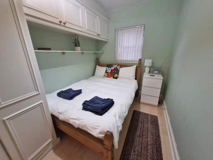 Second bedroom with double bed and plenty of storage