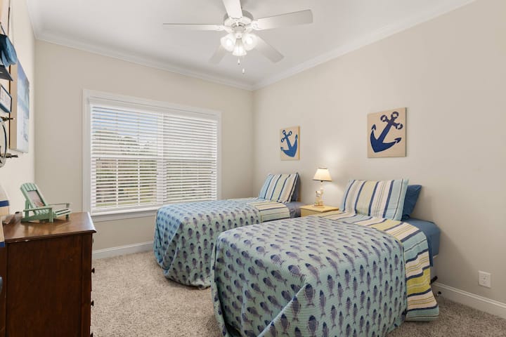 The twin bedroom is a perfect room for the kids to call home for the week.