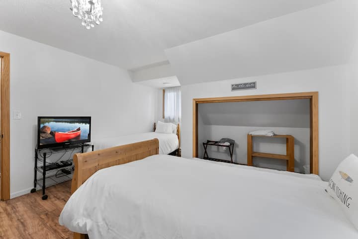 Dormitorio 4 con 3 camas individuales y 1 cama nido individual