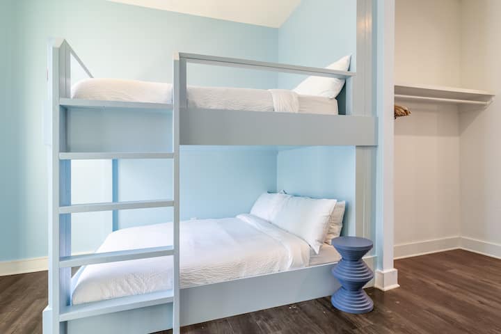 Bedroom 4 offers a queen over queen bunk bed.