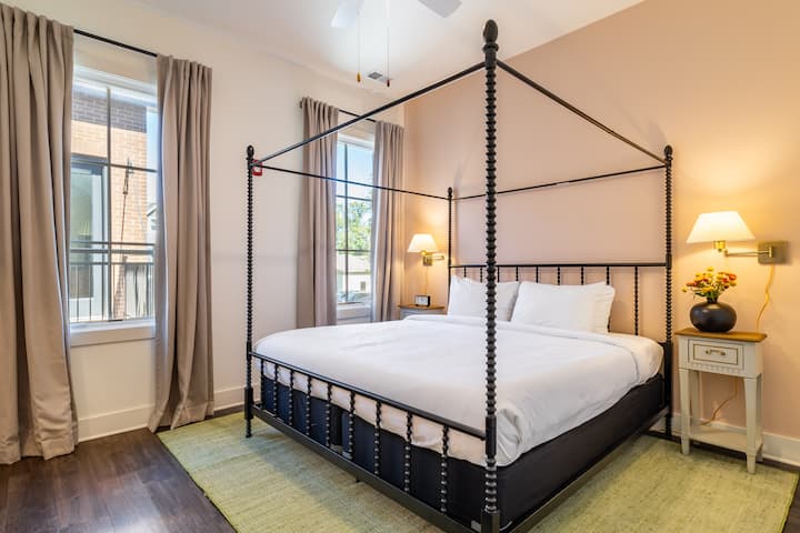 The primary bedroom offers a queen-sized bed.