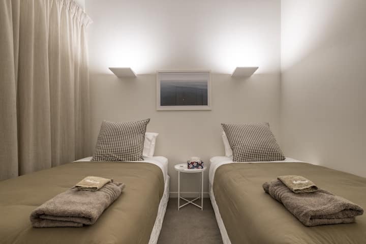 Double room with two king single beds and a heat pump in the 2nd floor