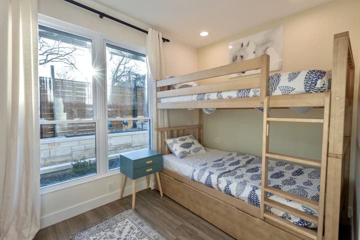 Bunk room with a trundle—ideal for kids, friends, or anyone who loves a good sleepover!