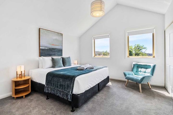 Main Bedroom King bed with a view , heating , wardrobe and private ensuite.