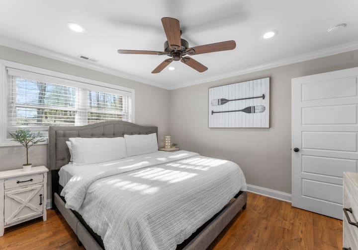 Main Level King Bedroom with TV & closet. 