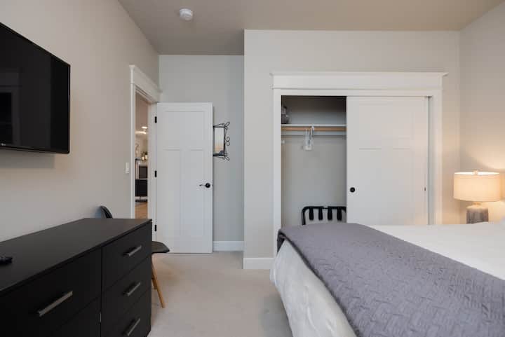 A king-sized bed & smart TV await in the second bedroom retreat​