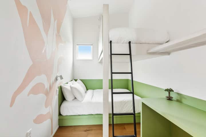 Bedroom 10: a full bed and a twin bunk, upstairs. The hall bath is steps away.
