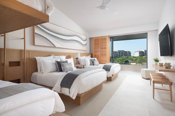 Bedroom three (2 Queen beds & 2 Bunk twin beds) + golf course view terrace + en-suite bathroom