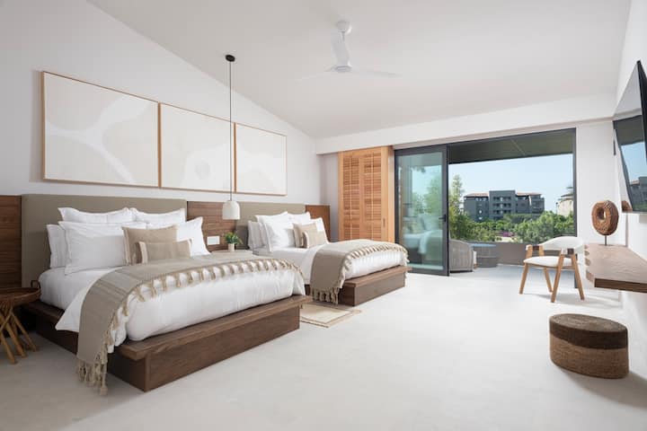 Bedroom four + golf course view terrace  + en-suite bathroom