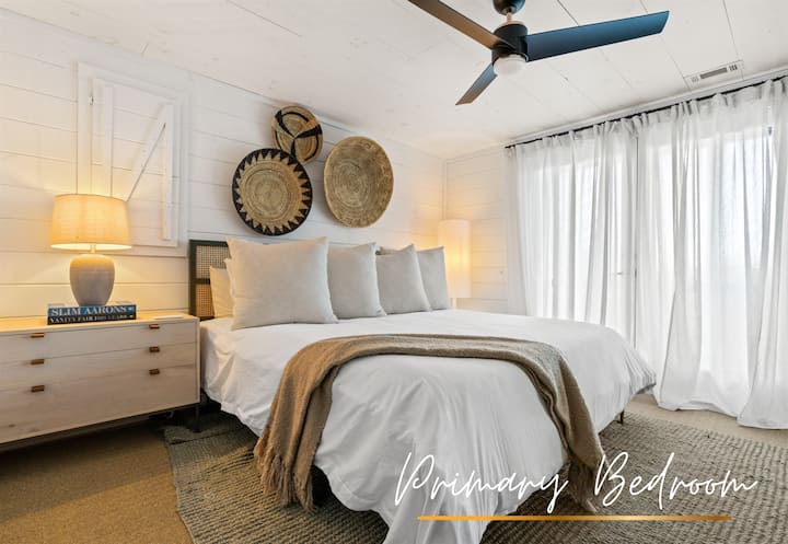The king bedroom invites you to relax with soft linens, stylish decor, and a peaceful mountain atmosphere.