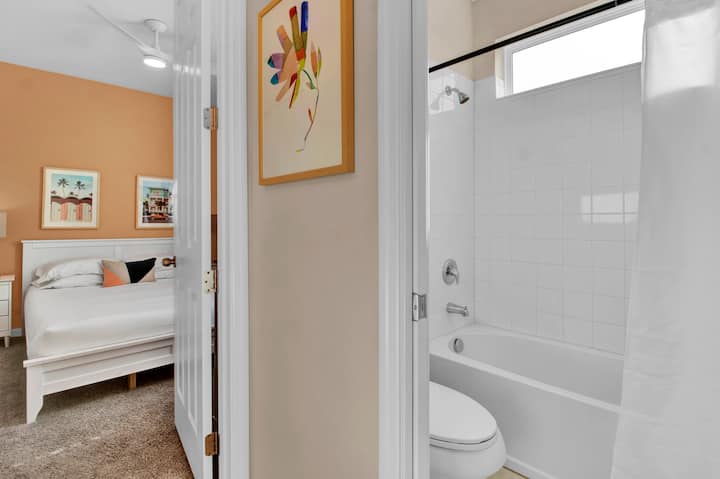 Bathroom 2 - shared bath for bedrooms 2 and 3 offers a dual vanity and a combo tub shower.