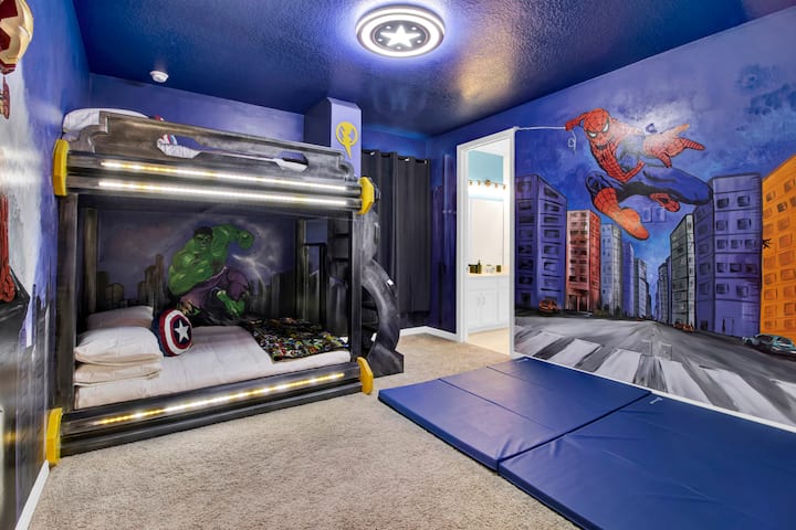 Bedroom 4 is an Avengers theme with a full bunk bed and a shared bathroom.