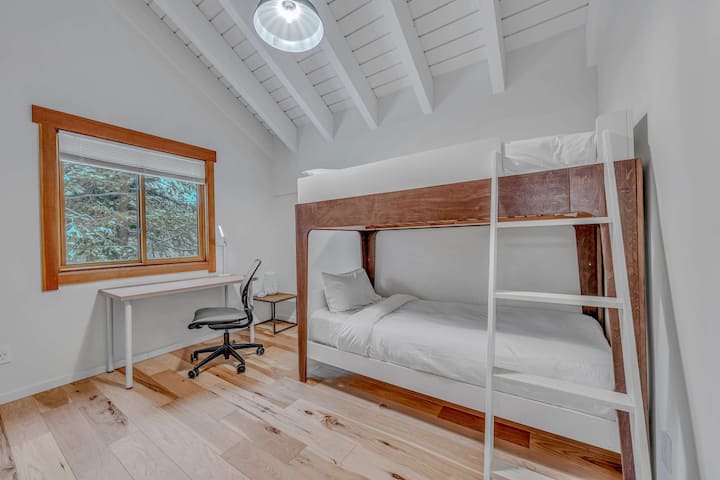 Bedroom 2: Twin bunk bed, dedicated workspace, upper floor