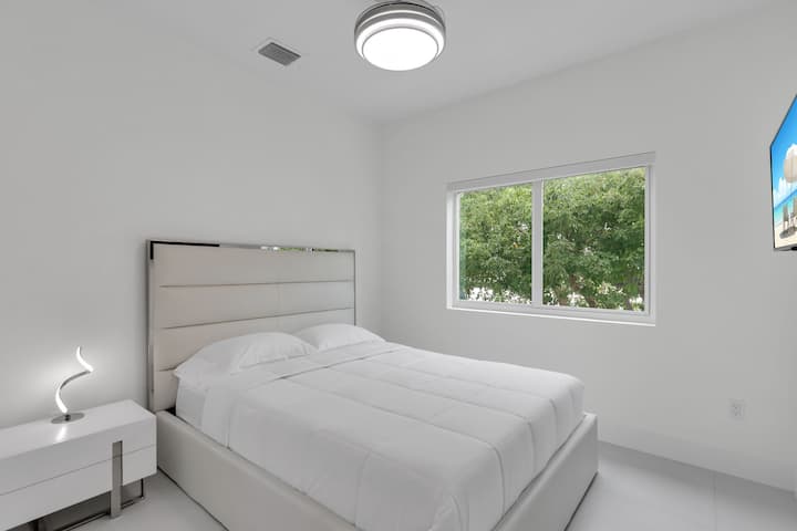 Bright and airy space with modern furnishings and serene views for ultimate relaxation!