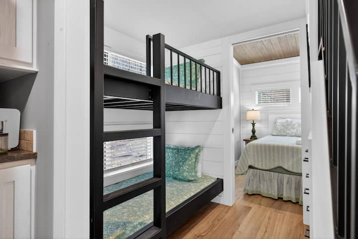 Built-in twin bunk sleeping area offers a fun and cozy space for kids or additional guests. Adult supervision is strongly recommended for small children using the upper bunk and ladder.