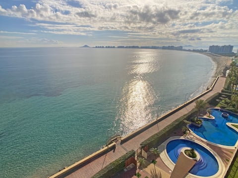 Stunning apartment with huge terrace front line to
