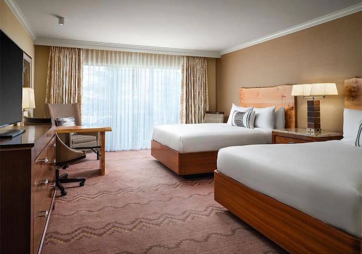 Settle in comfortably with two beds and a dedicated desk.