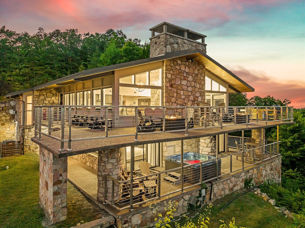 Main Lodge exterior with timber trusses and stonework