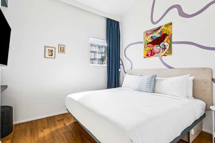 Bedroom 2: king bed, downstairs. The hall bath is steps away.