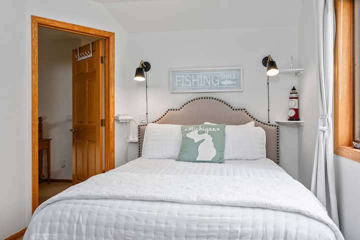 Third bedroom upstairs has a queen bed and TV