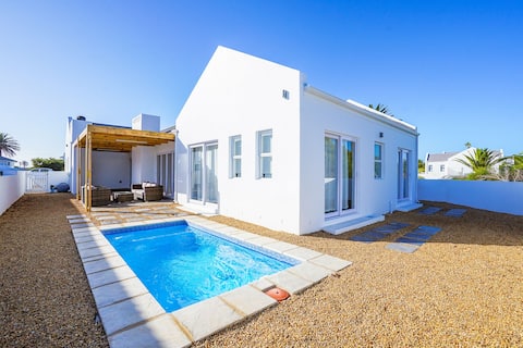 Sunlit Oasis Ocean and Golf Retreat