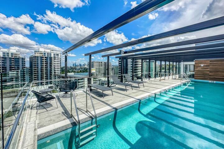 Illustration of Riverfront Industrial Apartments With Infinity Pool