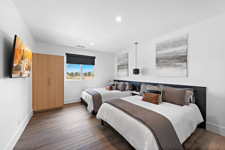 Dormitorio 3: 1 2 camas tamaño queen.