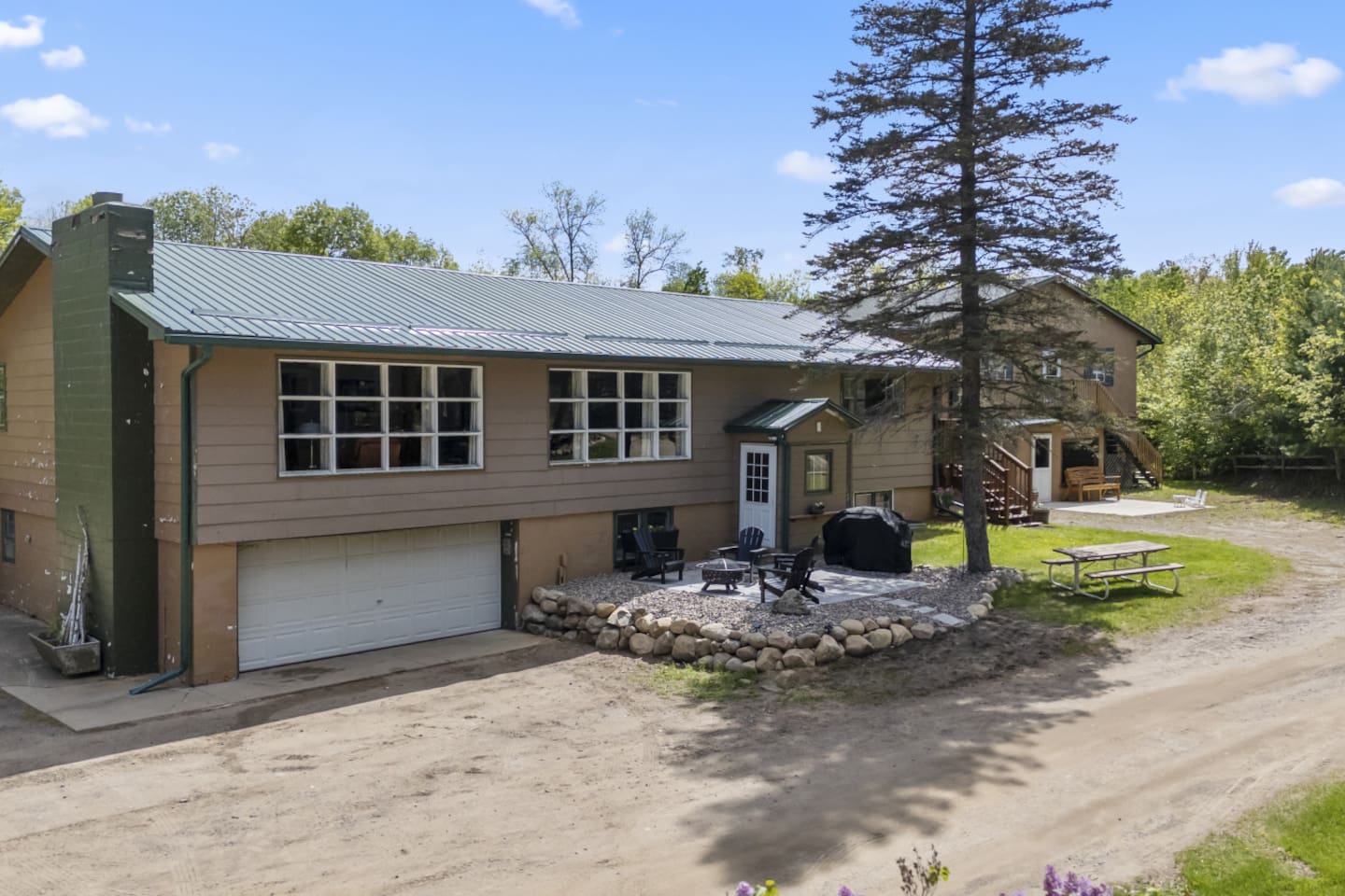 Front of Classic Cabin Patio and Firepit