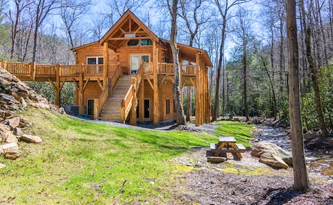 Popular Airbnb listing: Hideaway creekside cabin with hot tub and gameroom in Black Mountain