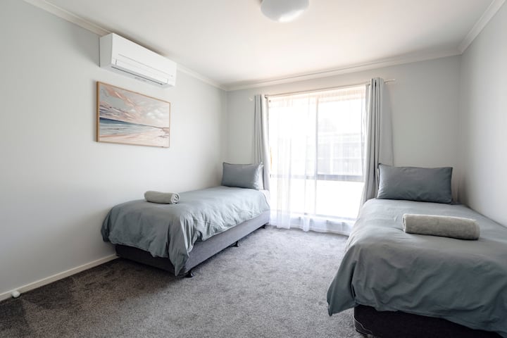 The second bedroom can be set up as 2 x Long Single Beds or 1 King bed (by request)