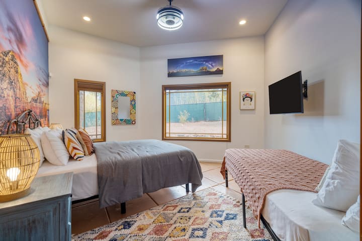 Bedroom 5 features a queen bed, a twin bed, and a TV.