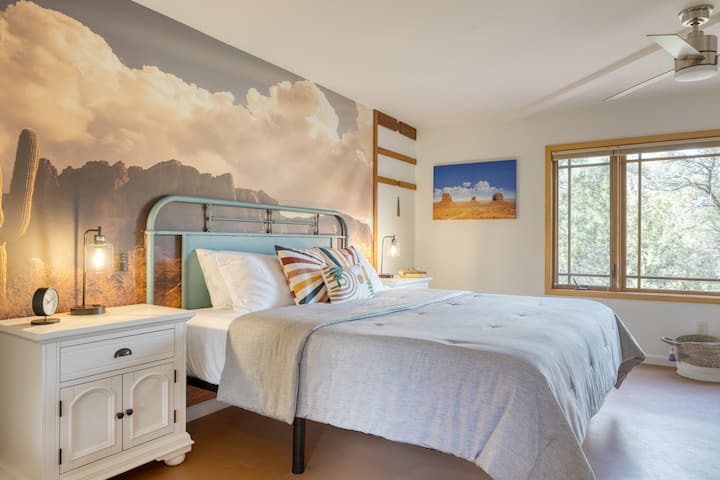 Bedroom 2 features a king bed, TV, and ensuite bathroom.