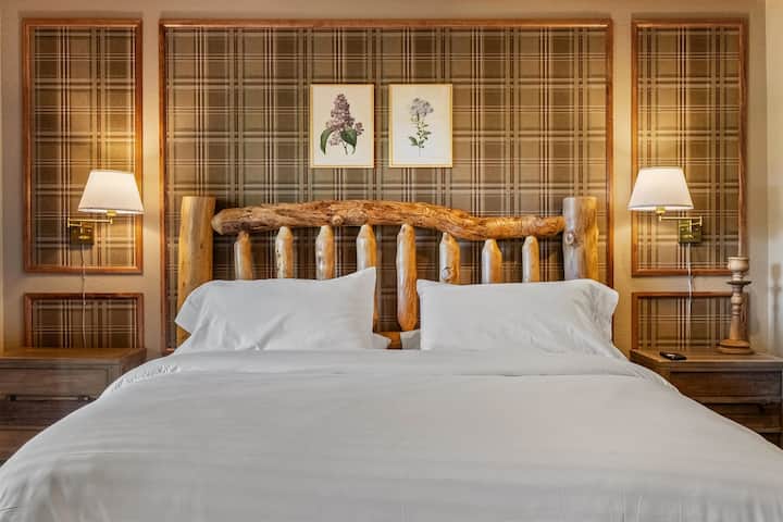 Relax in our Cozy King Plaid Suite (Bedroom 5)