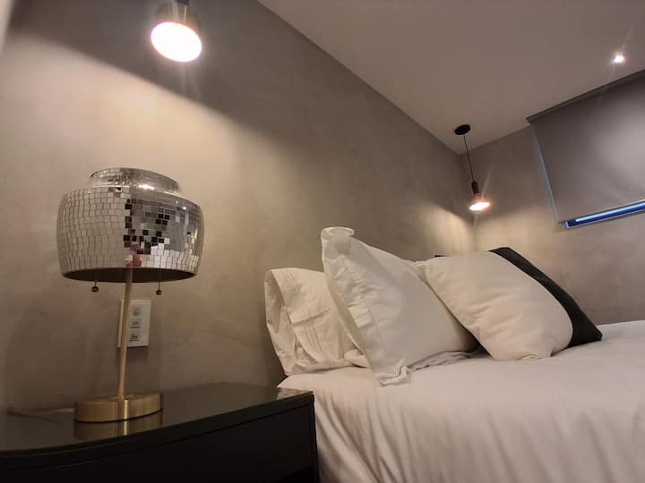 Quarto com cama queen size