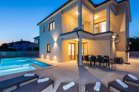 Luxurious private villa with a pool near the sea