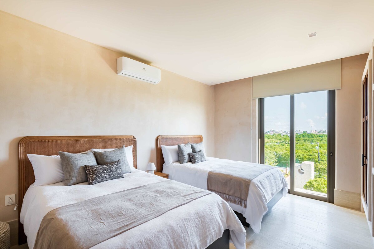 ห้องนอน 3 พร้อมเตียงมัทริโมนา 2 เตียงเครื่องปรับอากาศและห้องน้ำในตัวส่วนตัวและทีวี