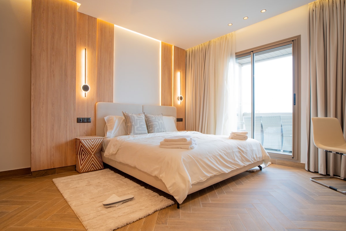 Pearl Dormitorio 1 con colchón tamaño queen y acceso a la terraza