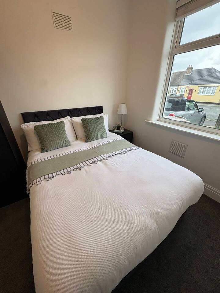 Serene bedroom with plush double bed